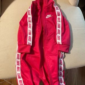 Pink Nike track suit